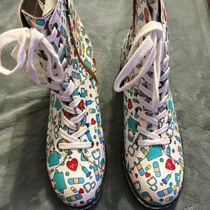 Women’s size 11 zippered boots with medical symbols super cute awesome boots